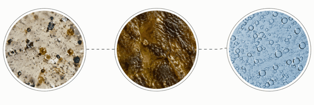 Microscopische weergave van vaste deeltjes, harsvorming door oxidatie en water in olie.